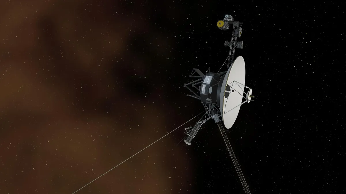 Artist's concept of a Voyager spacecraft, its white high-gain dish facing right
