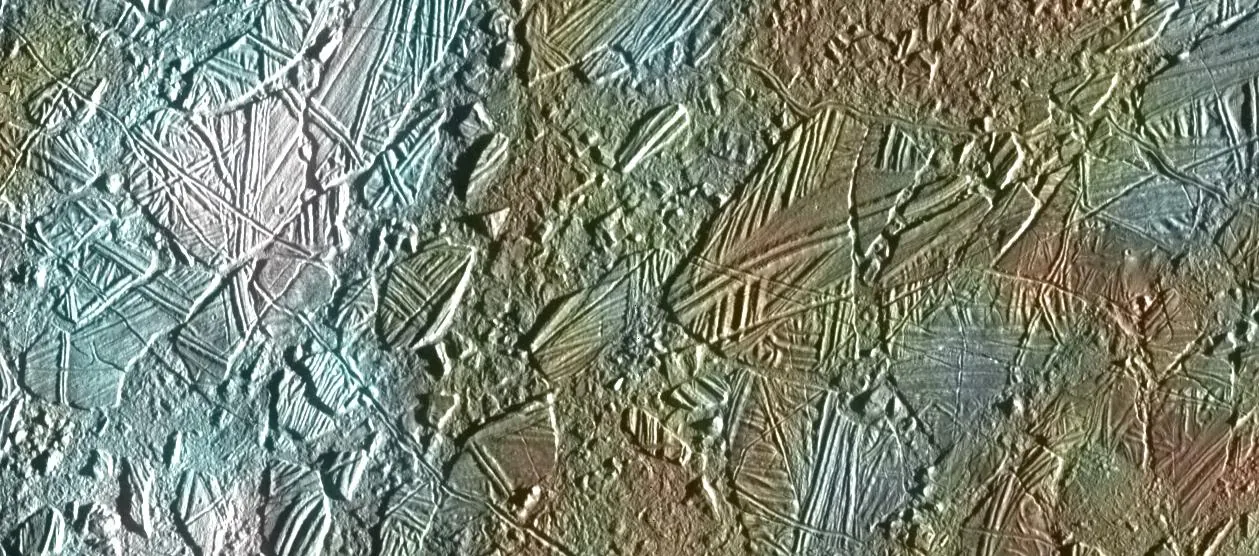 Conamara Chaos on Europa, imaged by Galileo, where the ice shell has broken into rafts
