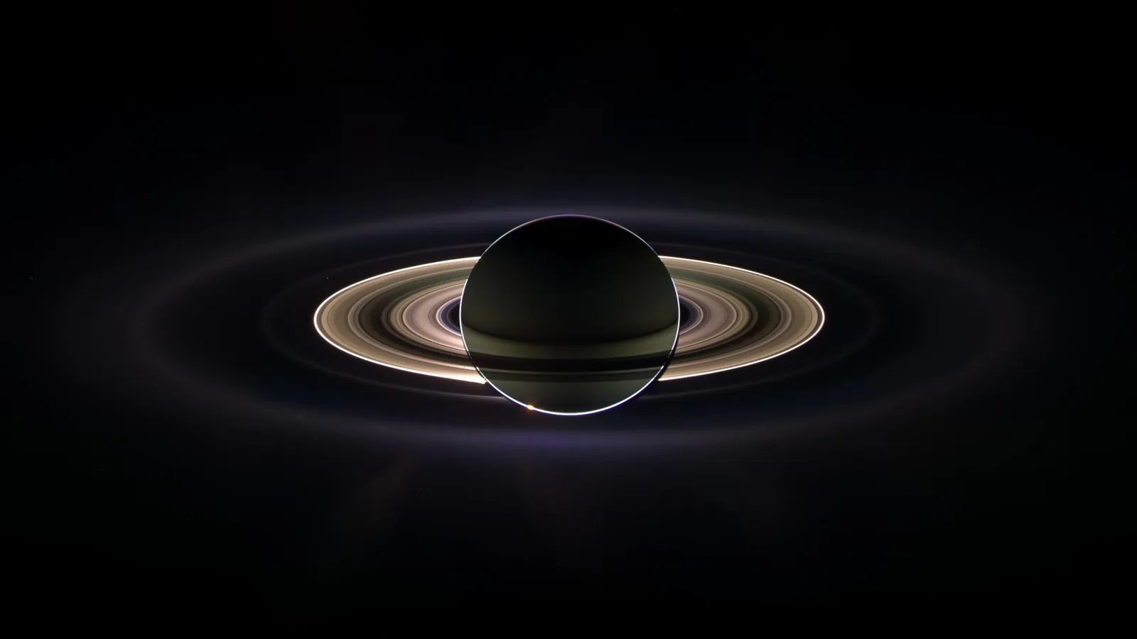 Saturn and its rings backlit by the Sun, seen by Cassini from within the planet's shadow
